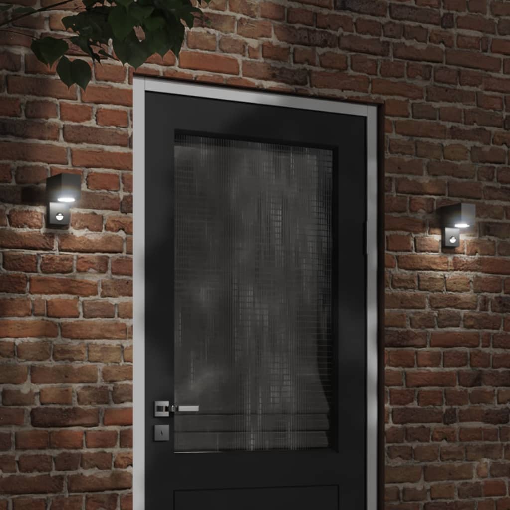 Black outdoor wall light with sensors